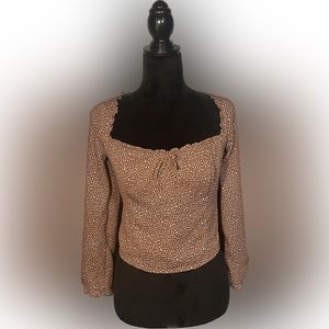 Adorable Abercrombie and Fitch top, brown with white dots and cut out back.